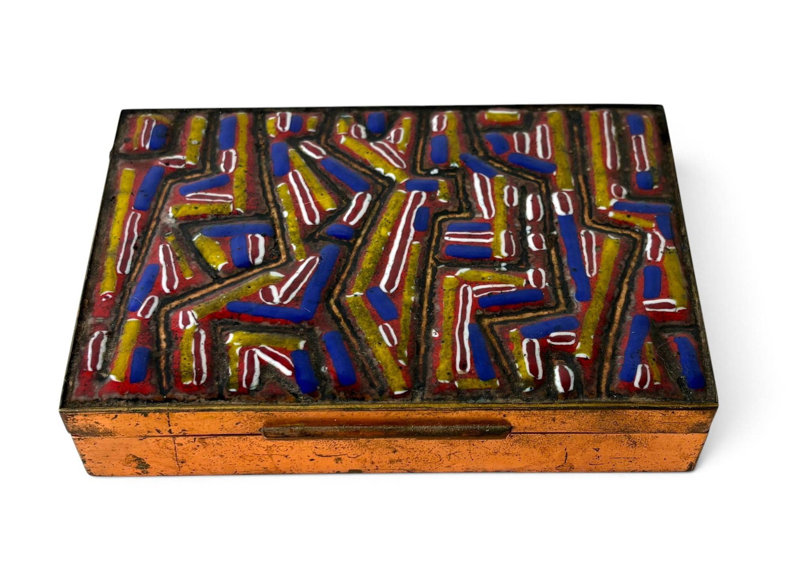 Vigna Nuova Mid-Century Copper and Enamel Box: Mid-century decorative box crafted by Vigna Nuova in Italy. The exterior features vibrant enamel with an abstract geometric design in red, blue, yellow, and white on a textured copper body. The
