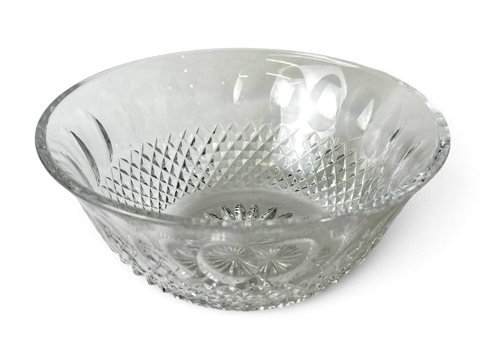 Waterford Colleen Short Stem Round Bowl: Waterford Colleen short stem round bowl crafted from clear crystal glass. Features a combination of diamond and vertical cuts characteristic of the Colleen pattern. Engraved Waterford hallmark is pres