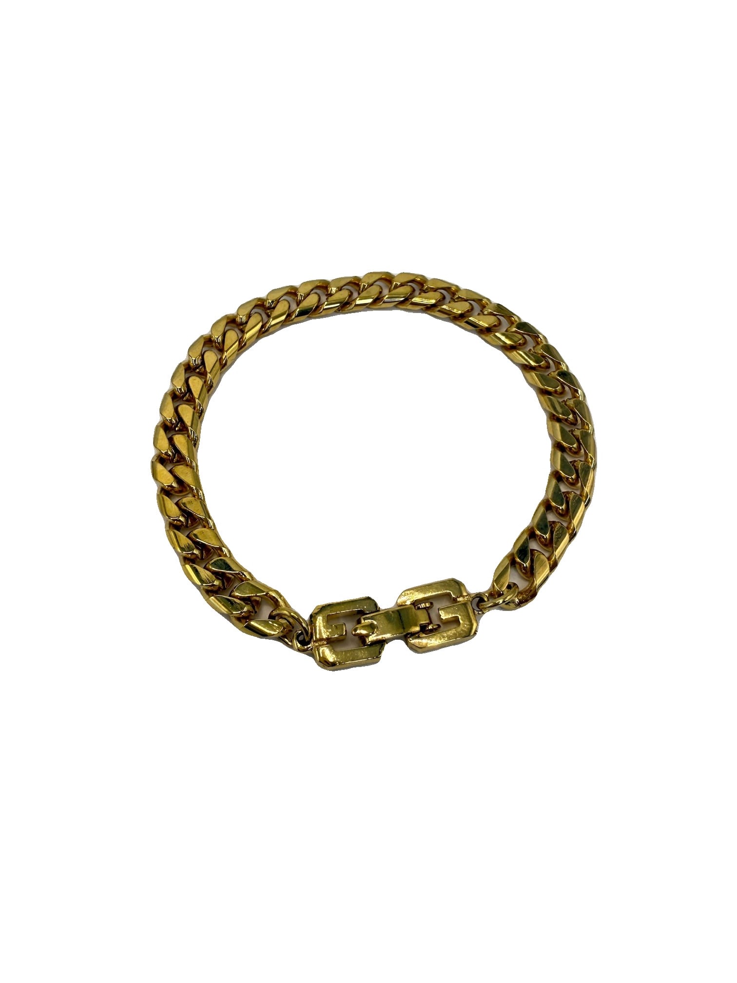 Givenchy Cuban Link Vintage Gold Chain Bracelet: This vintage Givenchy Cuban link bracelet showcases a striking gold-tone finish, exuding elegance and style. The design features interlocking links that create a bold and eye-catching statement piece.