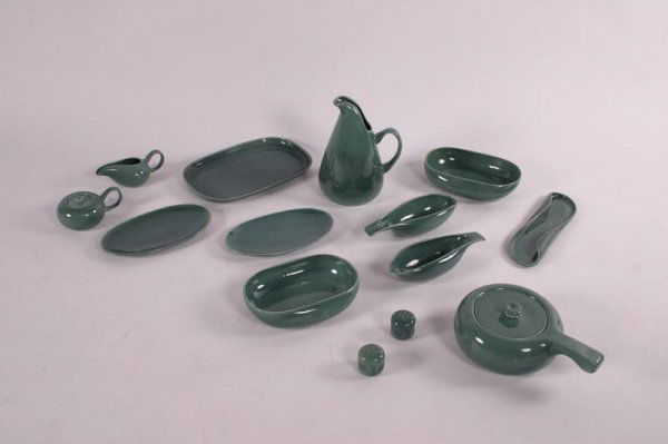Russel Wright Set of 14 serving pieces, USA circa: several sea green servers, dishes, salt/pepper, milk/sugar, pitcherManufacturer: Russel Wright Inc.