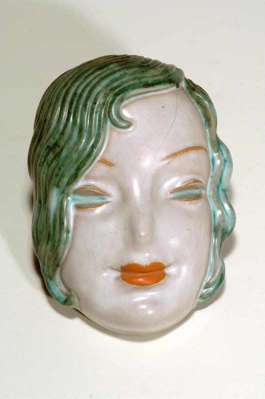 Goldscheider, Austria Ceramic head, Austria, 1900: Pierre Staudenmeyer: Roger Capron, Céramiste, page 146-151 / principales piéces de formes 1951-1965/5h x 3.5w inches, painted, glazed ceramic, signed on back as Goldscheider, Austria