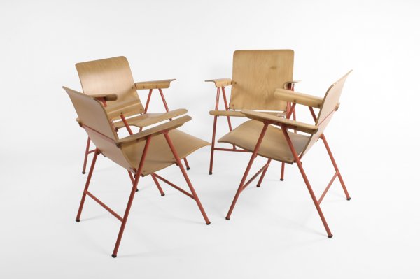 Russel Wright "Samson" folding chairs c. 1940: 30.5h x 24.5w x 25.5d x 17h seat inches, plywood and salmon color enameled iron base, labeled at the bottom Shwayder Bros Inc. Samson folding chairs, Detroit and Denver. Rare and collectible
