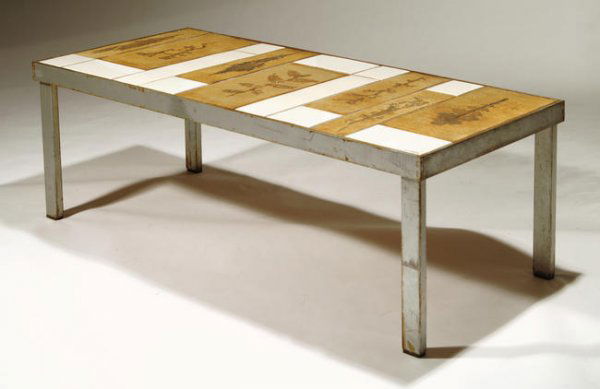 Roger Capron coffee table, Vallauris, France 1950: 15h x 42w x 19d inches, glazed ceramic panel with imprinted leaves, white ceramic panel, iron legs and base, signed