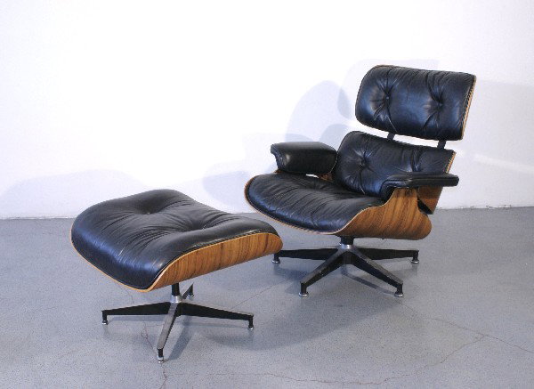 Charles and Ray Eames for Herman Miller 1950's: 32h x 31.5w x 25d x 17h seat inches, rosewood, black leather, both recliner and ottoman stamped with the original Herman Miller label