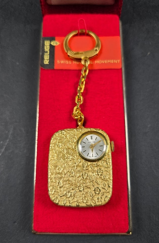 Reuge Swiss Musical Movement Keychain And Time Piece In Box Plays Edelweiss: These items were likely manufactured between the 1940s and the 1970s or later, depending on the model and features.