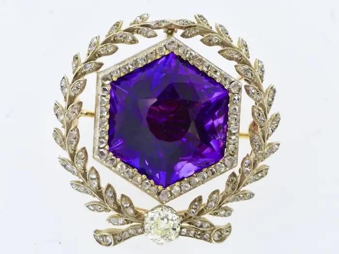 A SPECTACULAR LARGE SIBERIAN AMETHYST AND DIAMOND PENDANT/BROOCH, C. 1860: A SPECTACULAR LARGE SIBERIAN AMETHYST AND DIAMOND PENDANT/BROOCH, C. 1860 Description: This antique silver-top gold brooch pendant features a central 22-carat Siberian natural amethyst, in a beautiful