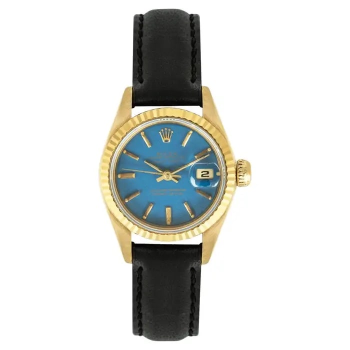 ROLEX DATEJUST RARE BLUE STELLA DIAL 69178: Description: This Rolex Datejust watch features a 26mm gold case, paired with a rare blue Stella dial and a gold triangular bezel. Please note that there is a slight "spider web pattern" on the dial s