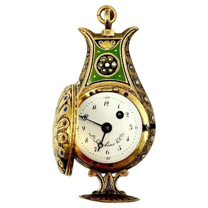 LOUIS DUCHENE & CIE. 18K GOLD ENAMEL PEARL DIAMOND SET LYRE FORM WATCH, C.1810: LOUIS DUCHENE & CIE. 18K GOLD ENAMEL PEARL DIAMOND SET LYRE FORM WATCH, C.1810 Description: A rare Louis Duchene & Cie. 18K gold painted enamel pearl diamond-set harp-shaped self-winding pocket watch
