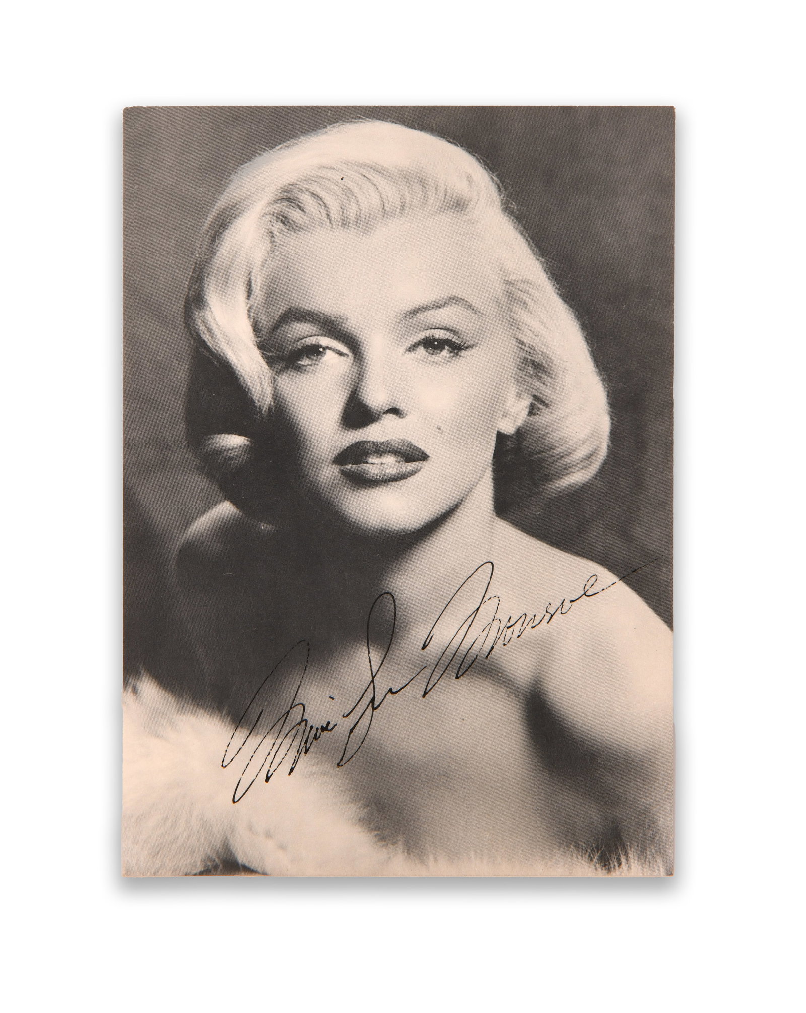 MARILYN MONROE (1926–1962), SIGNED PORTRAIT POSTCARD PHOTOGRAPH: MARILYN MONROE (1926–1962), SIGNED PORTRAIT POSTCARD PHOTOGRAPH Provenance and Authenticity: This item includes a certificate of authenticity. His Collectible Has Undergone Rigorous Authentication. 