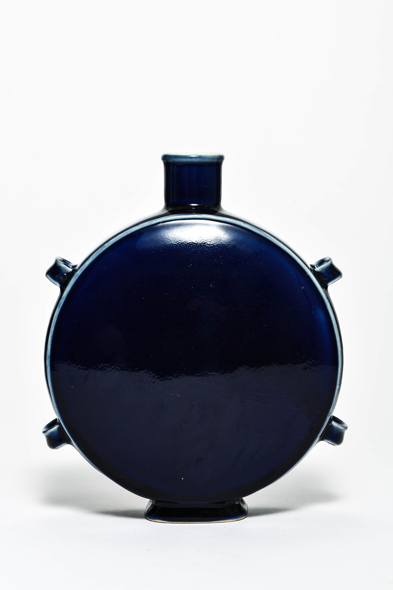 A SKY-BLUE GLAZED MOONFLASK: A SKY-BLUE GLAZED MOONFLASKDescription:Length: 19cm Width: 19cm Height: 24cm