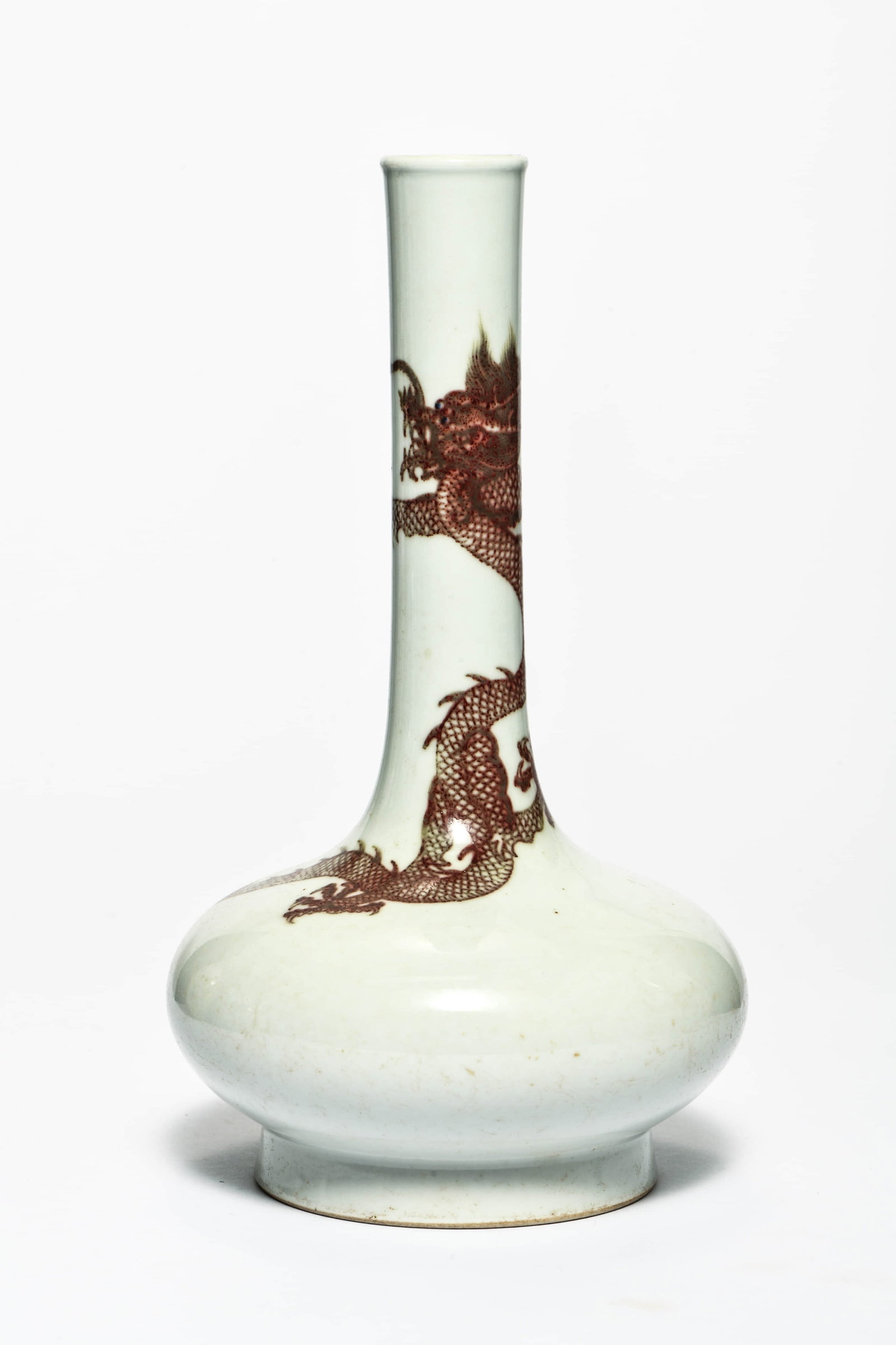AN IRON-RED 'DRAGON' LONG-NECKED VASE: AN IRON-RED 'DRAGON' LONG-NECKED VASE Description: Length: 15cm Width: 15cm Height: 27cm