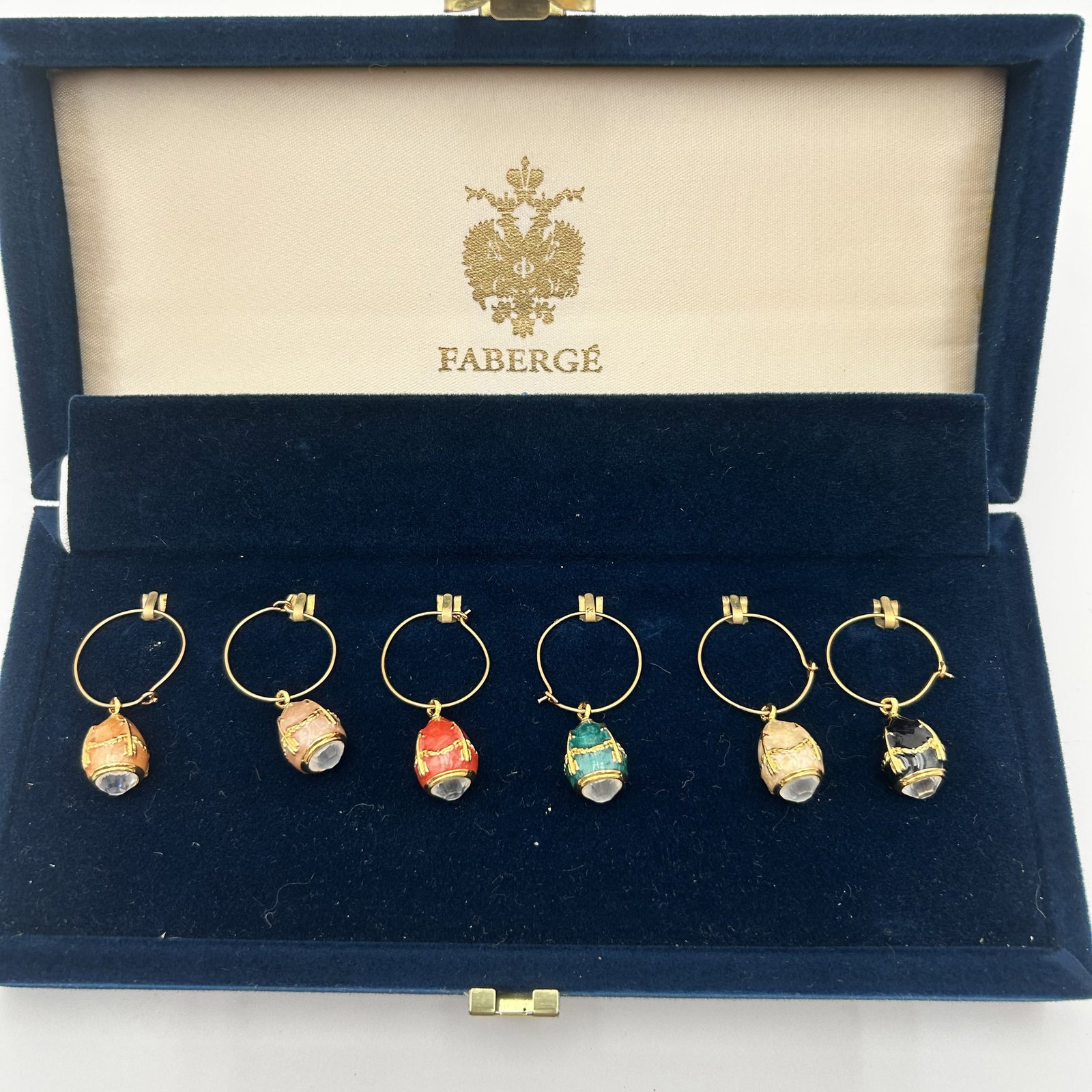 Faberge Enamel Imperial Egg Wine Charms: Faberge Enamel Imperial Egg Wine Charms Set of 6 in Original Velvet Box - Set #2 In original presentation box.