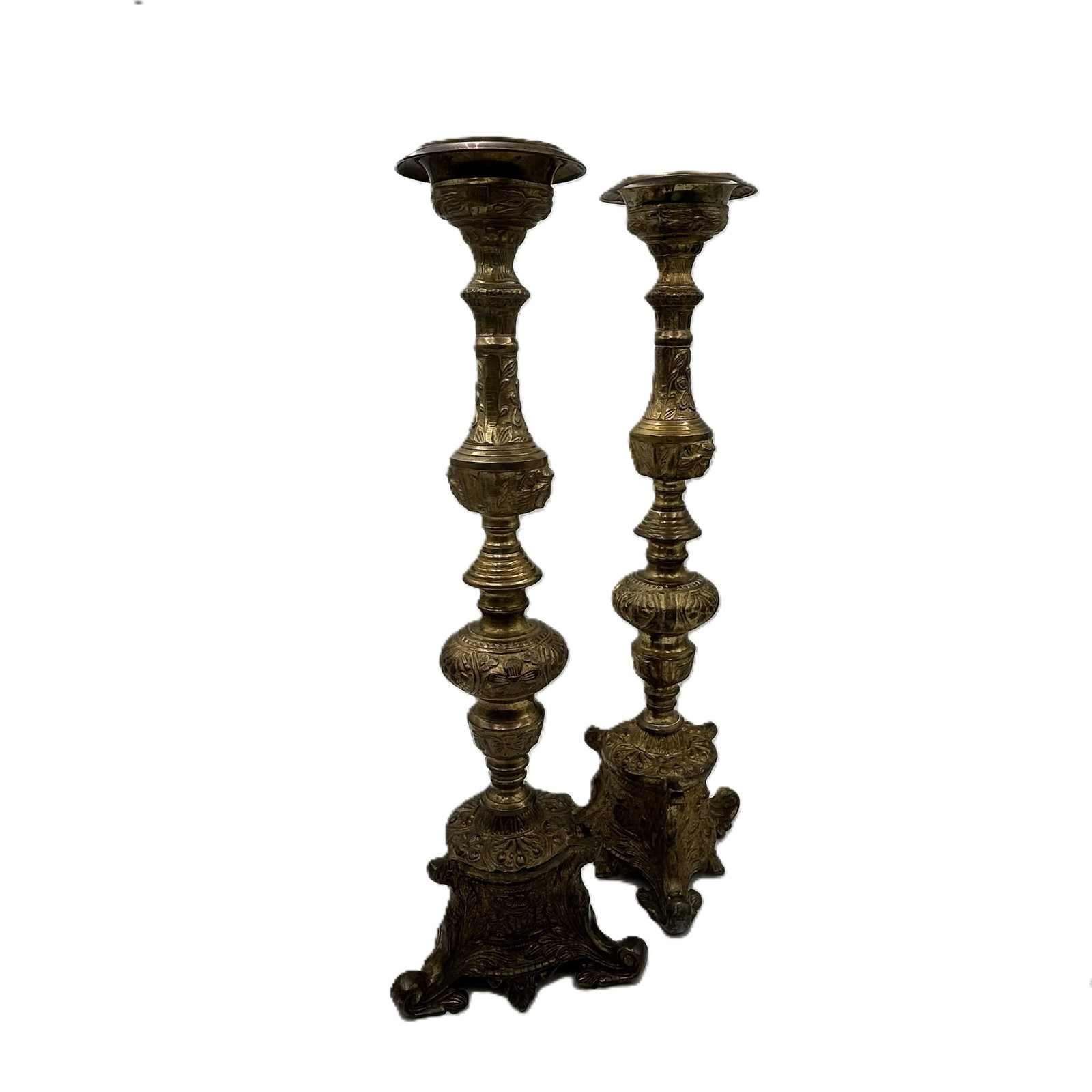 Pair of Large Vintage Brass Ornate Church Candlesticks: This is a pair of large vintage ornate church candlesticks with decorated tripod base, resting on three lion paws. The base and the body of the candlestick is decorated with angles. Dimensions: - 8" W
