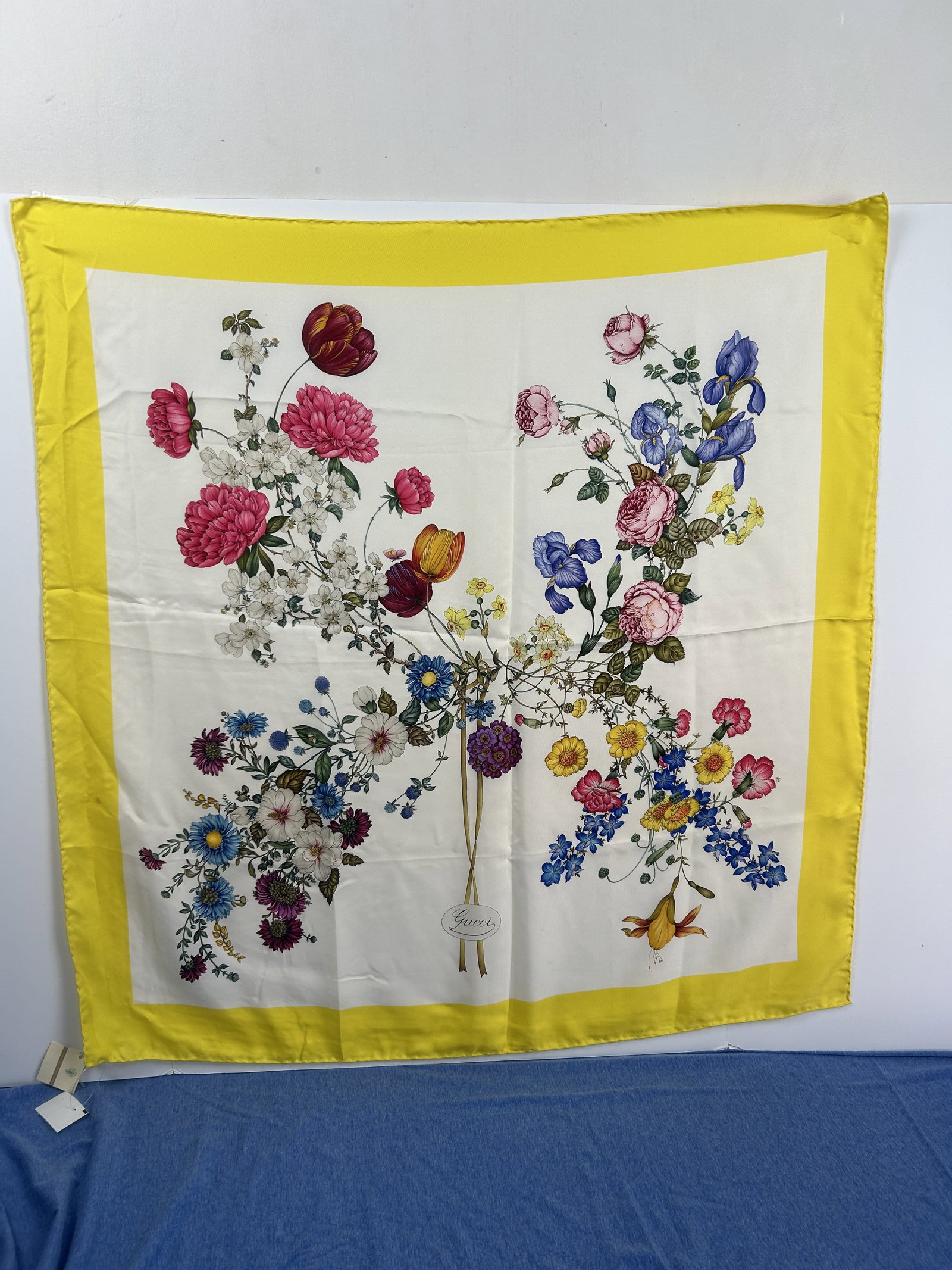 Authentic Gucci Silk Floral Scarf (Yellow Trim) NWT: Authentic Gucci Accessory Collection Scarf 100% Silk New with tags: brand-new, unused, and unworn item Multi-color Flowers Gucci Accessory Collection Manufactured in Italy Square Yellow, Pink, Blue, W