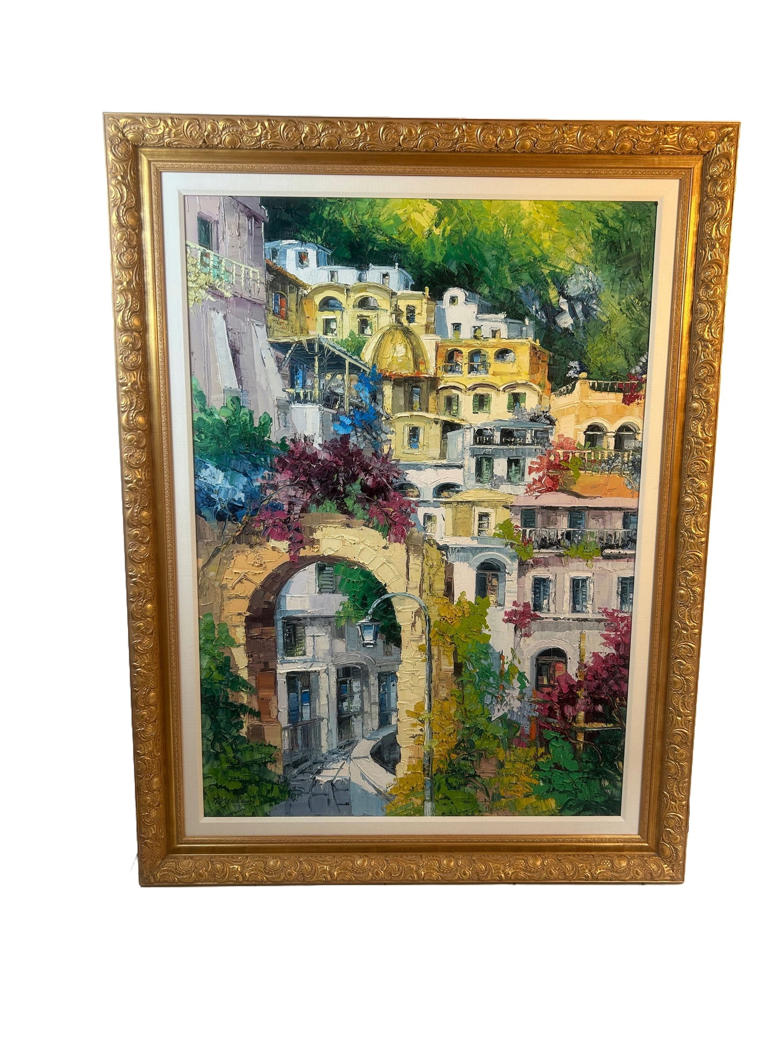 “Positano?? by Antonio DiViccaro Oil Painting Framed: Extra large, framed and matted oil on canvas “Positano” by Antonio DiViccaro. Note that the paint is slightly raised to bring out the vivid buildiings and flowers, making you feel like you