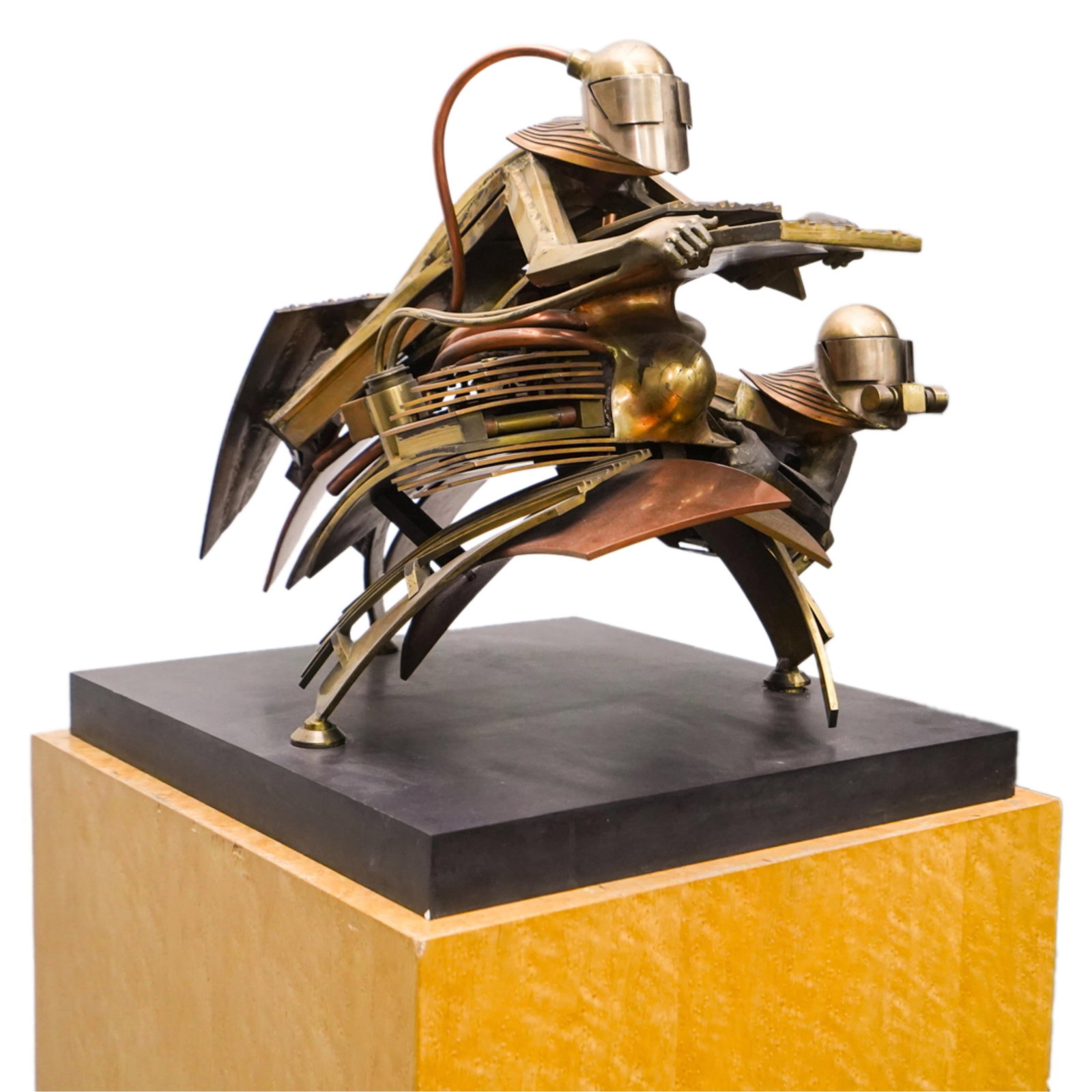 Sean Rice (British, 1931-1997) Motorcycle and Sidecar Sculpture: Modernist sculpture by Sean Rice (British, 1931-1997) comprised of bronze, copper and other metal, depicting a motorcycle rider and sidecar passenger. Apparently unmarked. Includes a wooden pedestal.