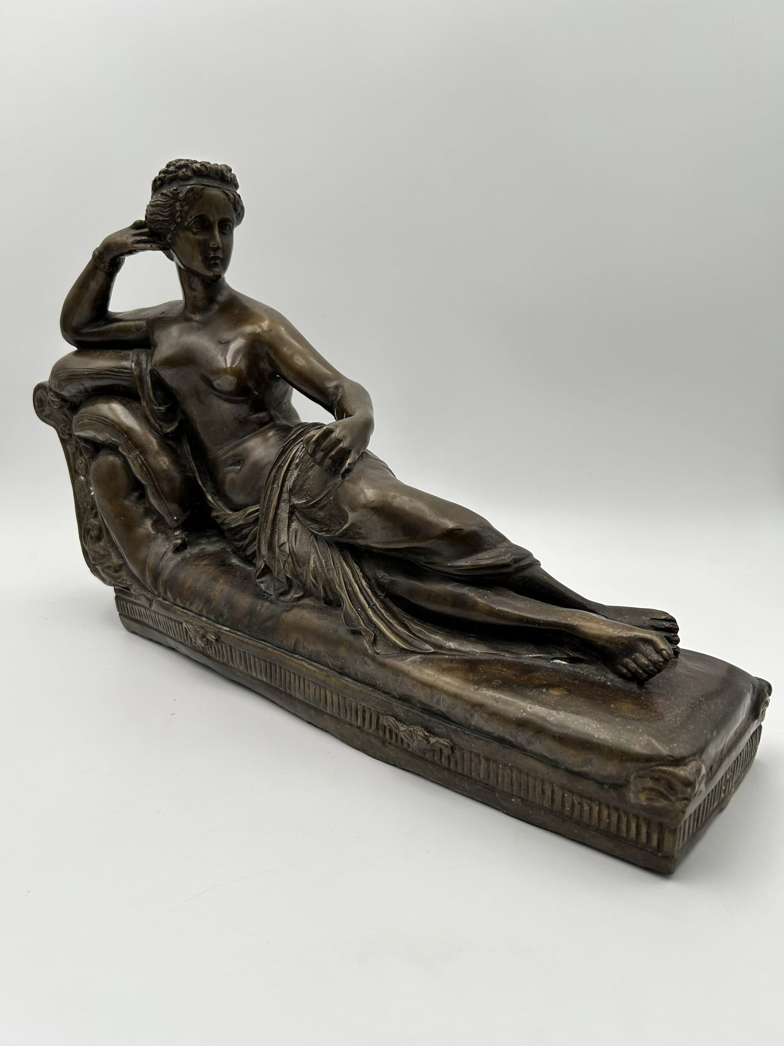 Bronze Sculpture "Paolina Bonaparte as Venus Vectrix"": This is a bronze sculpture titled "Paolina Bonaparte as Venus Victrix" after the original neoclassical masterpiece by Antonio Canova. Pauline Bonaparte, sister of Napolean, here is reclining on a chai