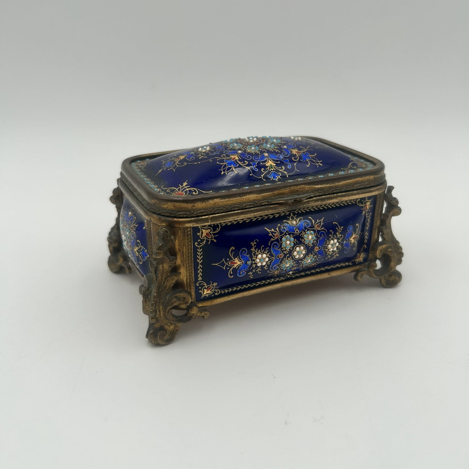 Antique Napoleon III French Kiln-fired Cobalt Enamel Jewelry Box, "Jeweled": This is an antique Napoleon III French kiln-fired cobalt enamel jewelry box. Ornate 'jewel' like decoration on cobalt blue convex enamel panels on all sides, scrolling cabriole style legs and in wonde