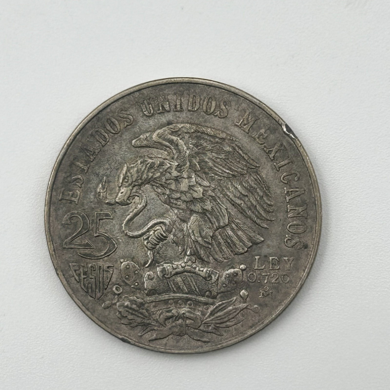 1968 Mexico Silver 25 Pesos Olympic Commemorative Coin: This listing is for a 1968 Mexico Silver 25 Pesos Olympic Commemorative Coin. 72% Pure Silver .5209 Troy ounces 0926-C5