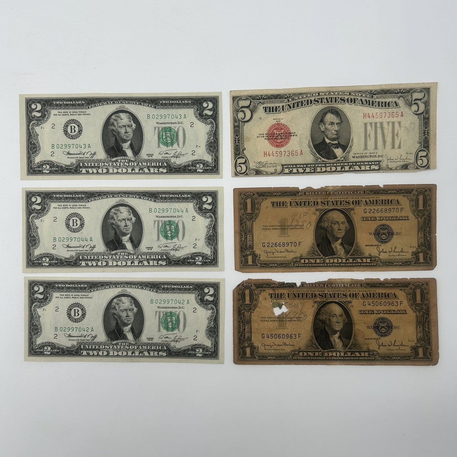Series 1976, 1928E and 1935D Notes (Qty 6): This listing is for six (6) series of bills: - Series 1976 $2 Federal Reserve Notes (Qty 3) - Series 1928E $5 United States Note - Red Seal (Qty 1) - Series 1935D $1 Silver Certificates (Qty 2) Total