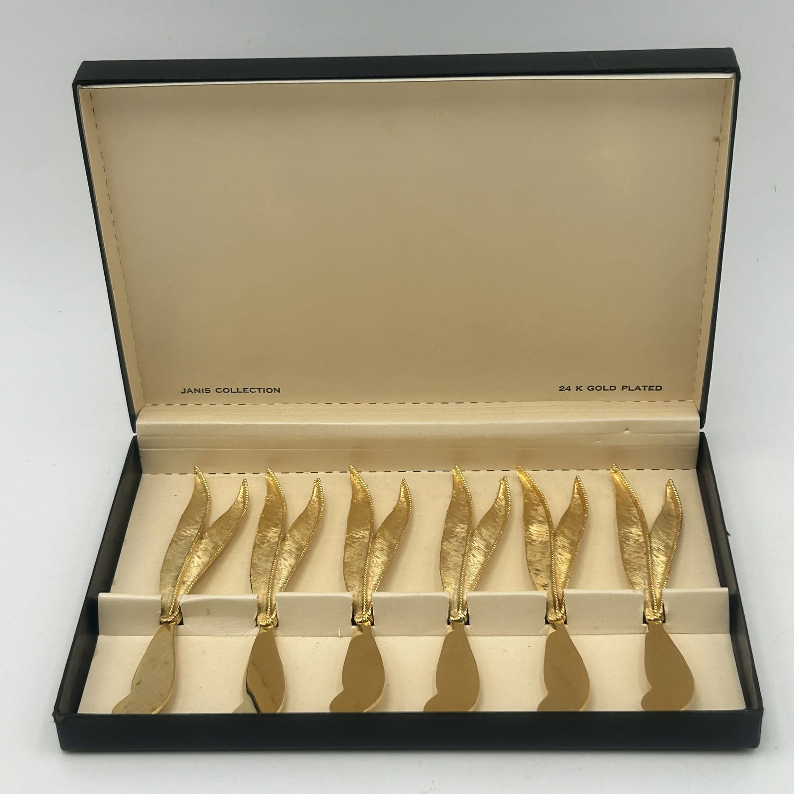 Vintage Janis Collection 24K Gold-Plated Cocktail Knives - Set of 6: This is a vintage Janis Collection 24K gold-plated cocktail knives set featuring elegant, textured leaf handles. Boxed Set of Six (6)