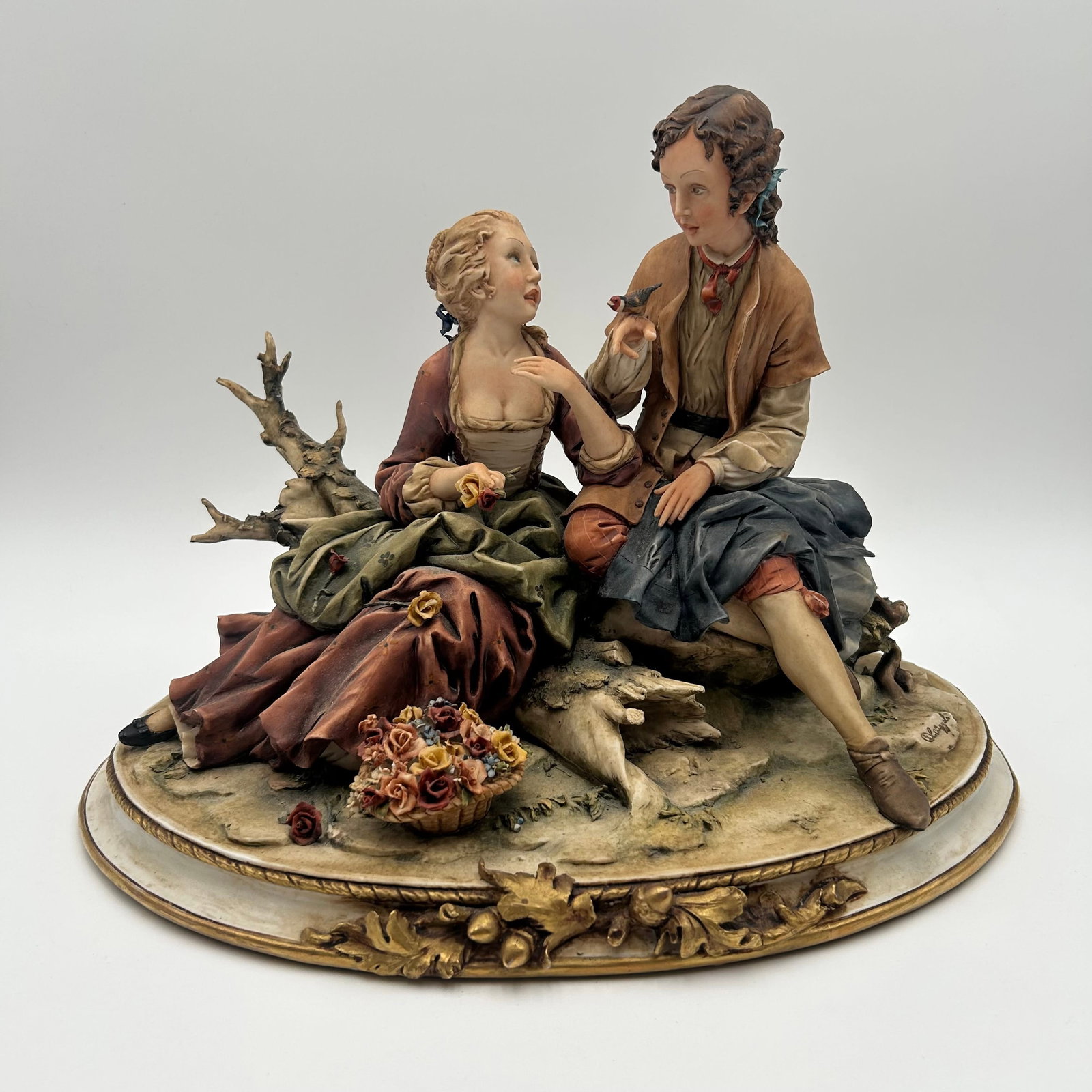 Vintage Capodimonte Porcelain Couple, Signed: Vintage Italian porcelain couple figurine signed. Very delicate and beautifully done. Artist is D. Careggia