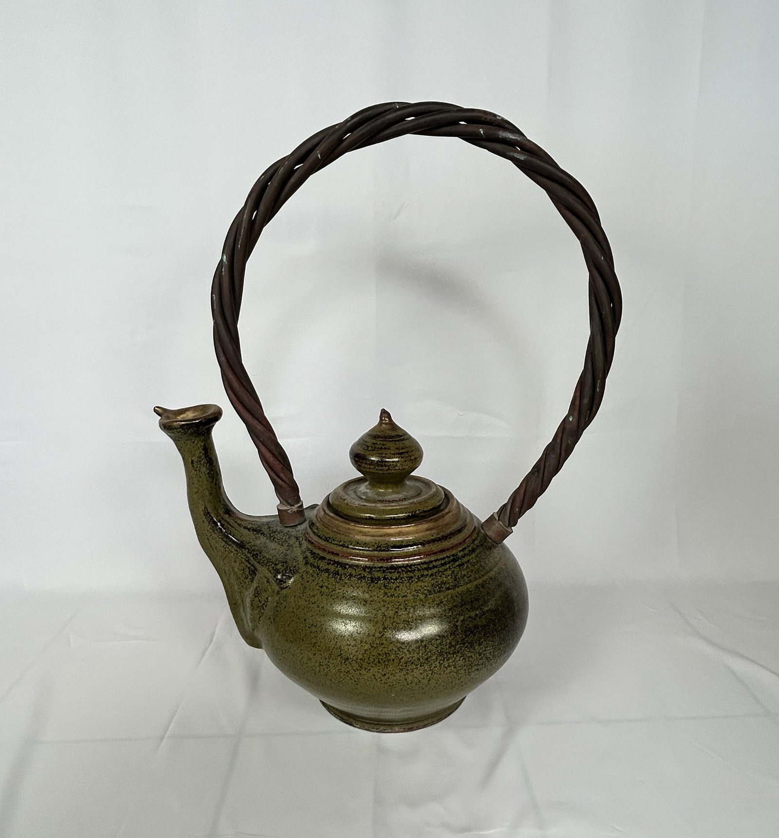 XL Handcrafted Ceramic Pottery Teapot w/ Copper woven Handle: This is a very large handcrafted ceramic pottery teapot with a copper wire woven handle. Dimensions: 16" W x 11" D x 26" H