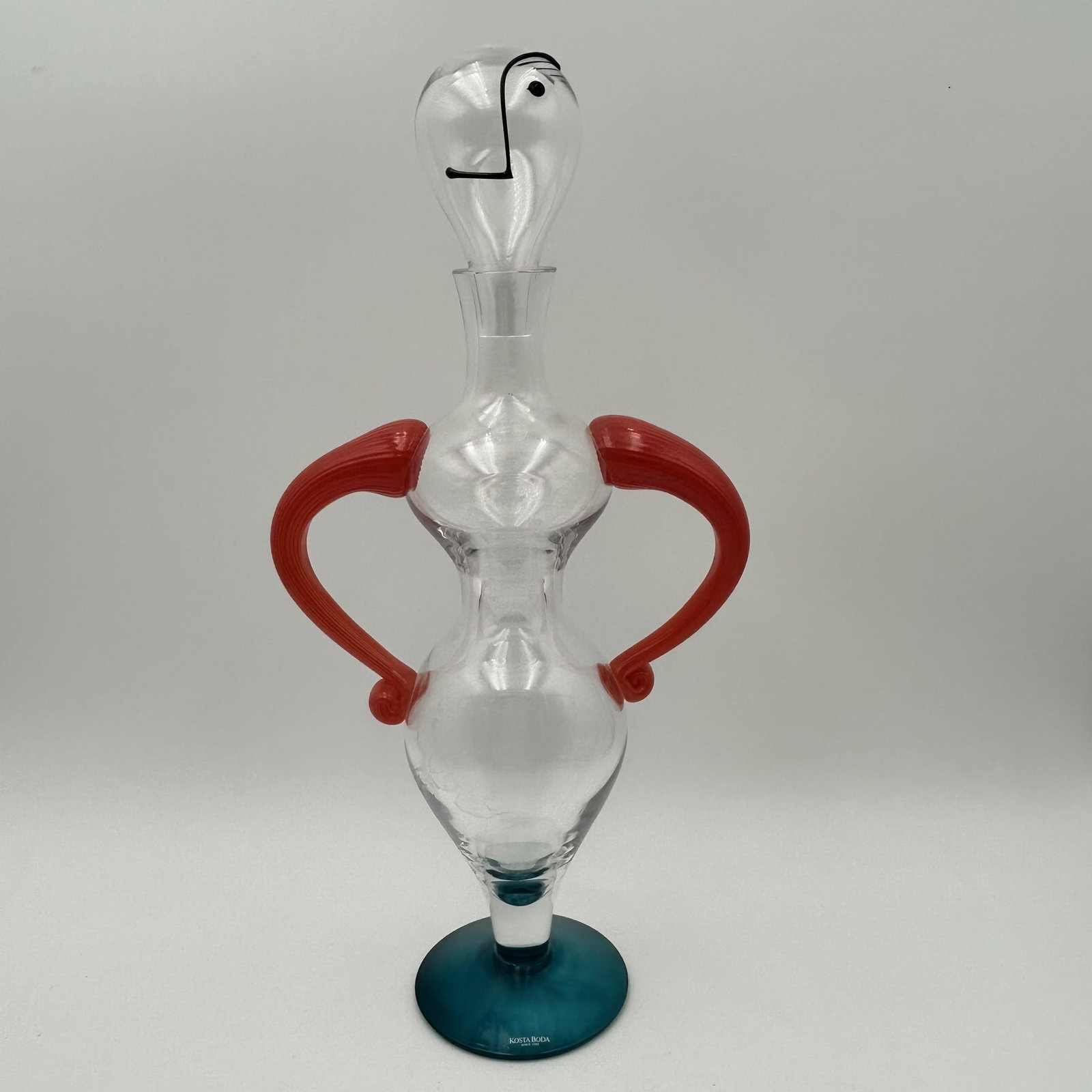 Kosta Boda "Fenix" Glass Decanter: This is a Kosta Bota "Fenix", Model 89201, created by Kjell Engman. Colorful art glass decanter, vintage. No chips or cracks.