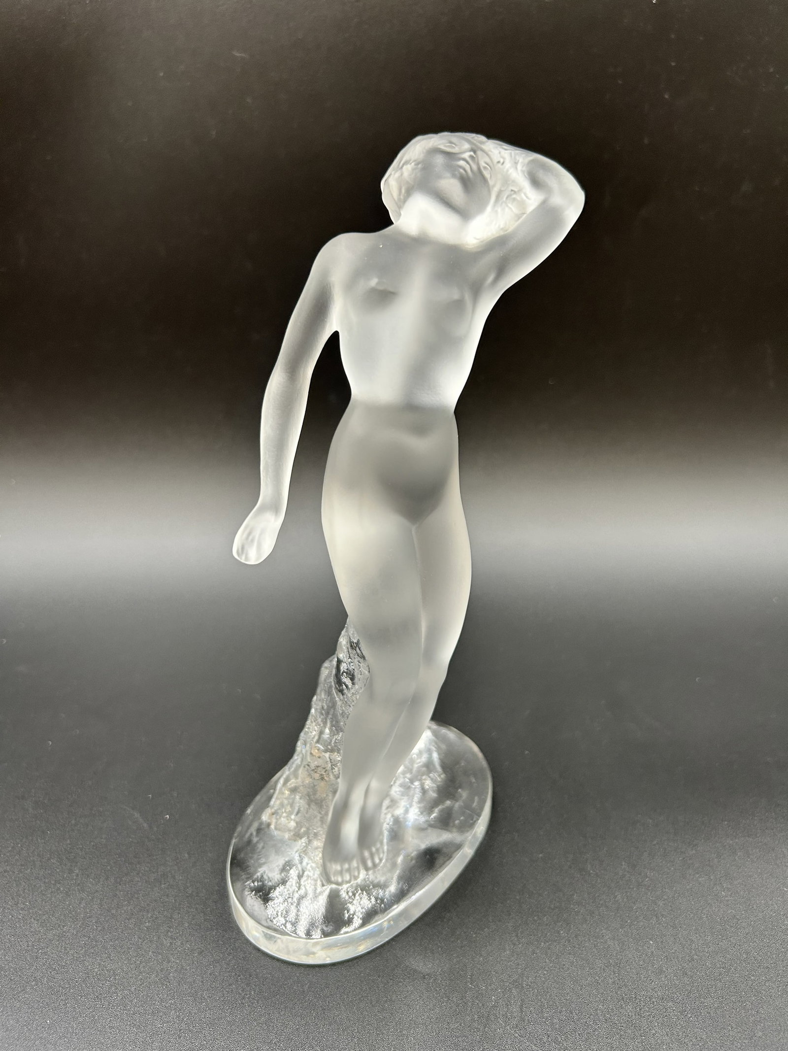 Lalique France “Danseuse Bras Baisse" circa 1960: Lalique France “Danseuse Bras Baisse” (Dancer with Arm Down). Model # 11910, designed by Rene Lalique's son Marc Lalique (1900-77) circa 1960. Material - Frosted and clear crystal Signature - 