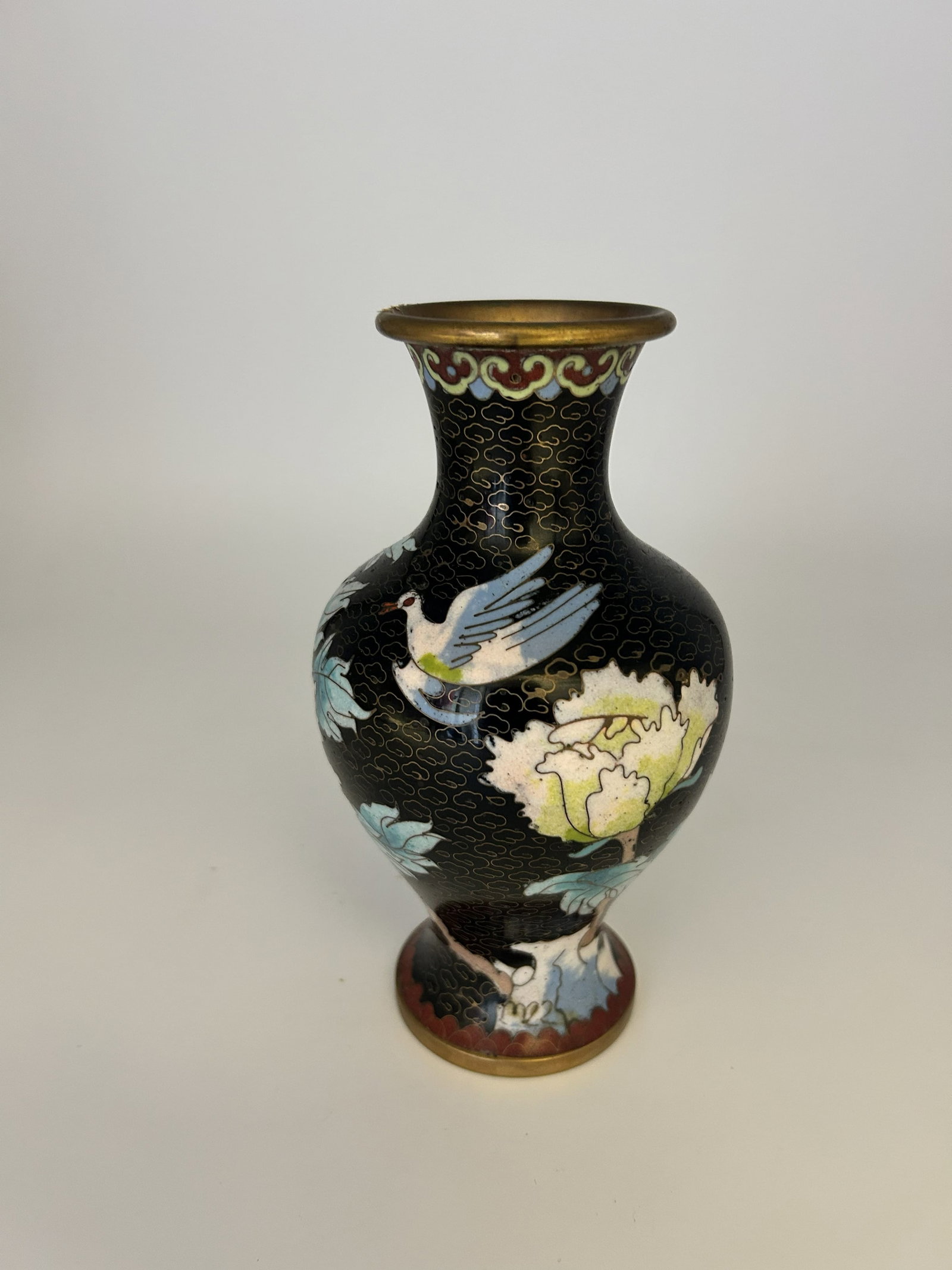 Pair of Vintage Chinese Cloisonne Brass Enamel Vases: Pair of vintage Chinese cloisonne brass enamel vases, on black background to bring out the vivid colors of the flowers and birds.