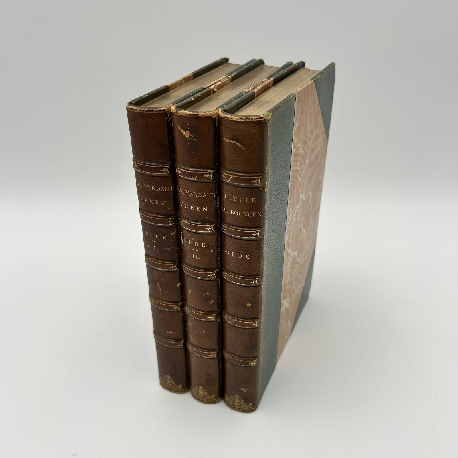 3 Antique Books by Cuthbert Bede, B.A.: Three (3) antique books published by Little, Brown, and Company, Boston, Mass, by author Cuthbert Bede, B.A. - "Little Mr. Bouncer and his friend Verdant Green" (1893) - "The Further Adventures of