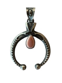 Pink conch and Sterling silver Naja pendant made by Navajo artist Kevin Billah