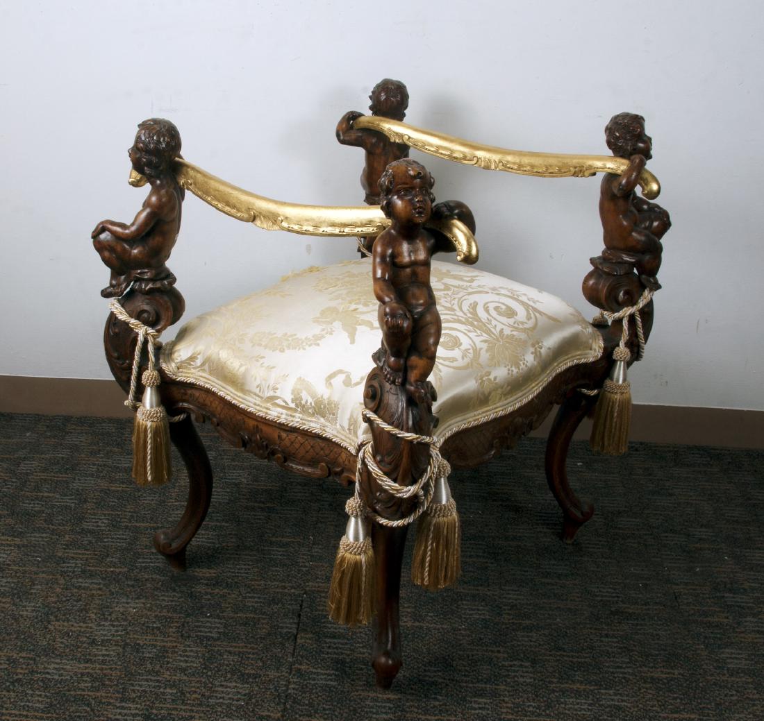 HIGH ARMED SETTEE WITH CHERUBS: High Armed Settee With Cherubs: A wood settee with a cream cushion. Cherubs support the armrests, and tassels encircle the beginning of the scrolled legs. 30" X 24&qu