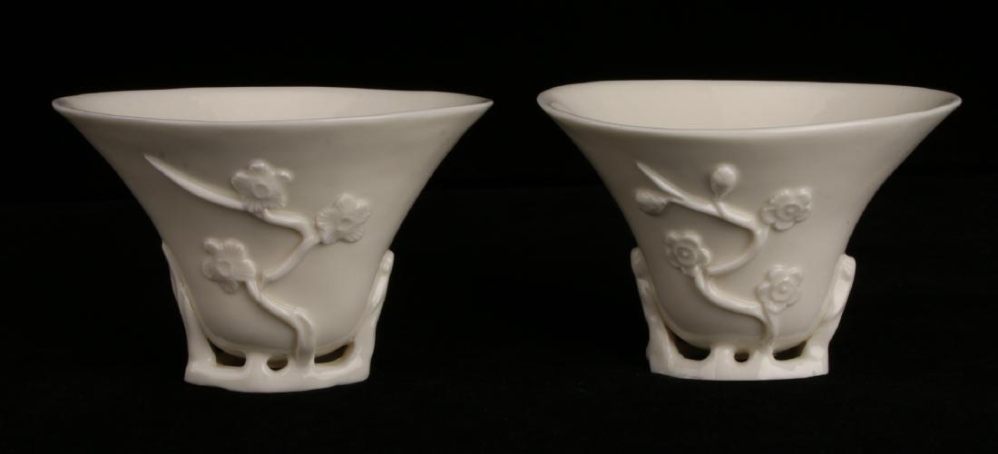 PAIR OF PORCELAIN RHINOCEROS FORM LIBATION CUPS (1 of 6)