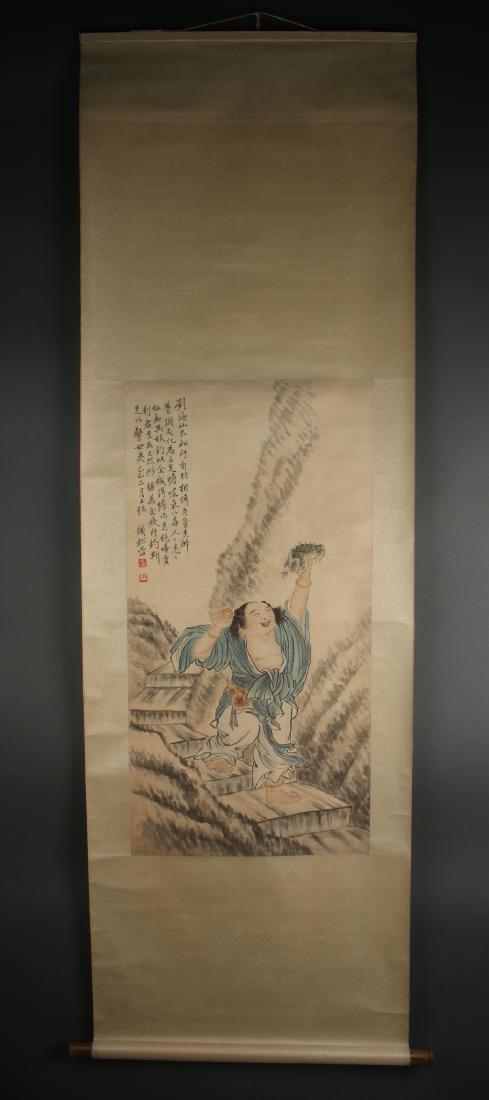 SCROLL OF IMMORTAL HOLDING LIZARD: Scroll Of Immortal Holding Lizard: A barefoot immortal walks down steps from a mountain holding a coin in one hand, and a lizard in the other. He has blue robes, bracelets, anklets, and carries a gou