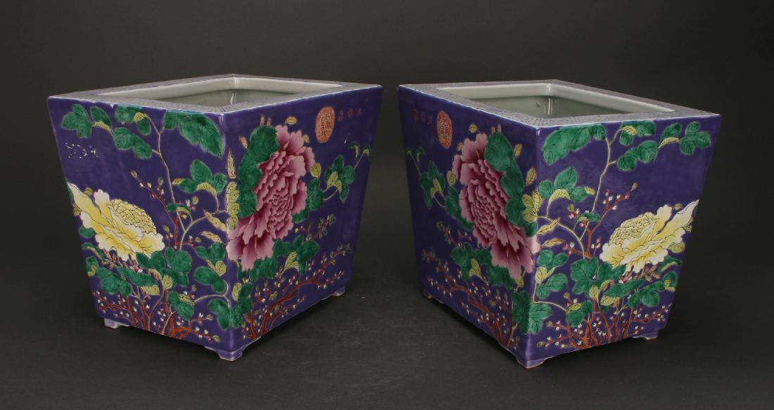 PAIR OF SQUARE MIRRORED PURPLE PLANTERS: Pair Of Square Mirrored Purple Planters: These rich purple planters mirror each other's images and are painted with a lush peony garden showing buds and full blown peonies. They are surrounded by soar
