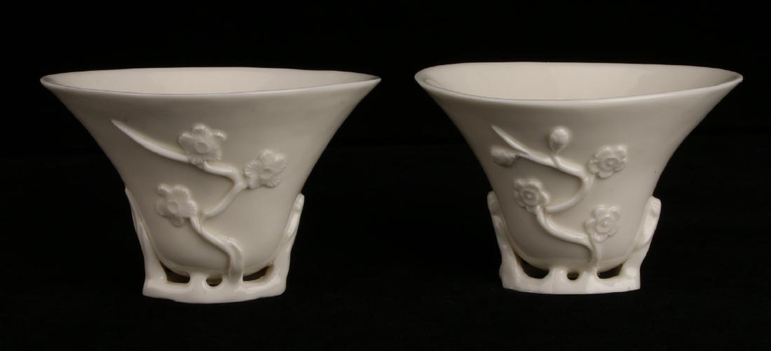 PAIR OF PORCELAIN RHINOCEROS FORM LIBATION CUPS (1 of 6)