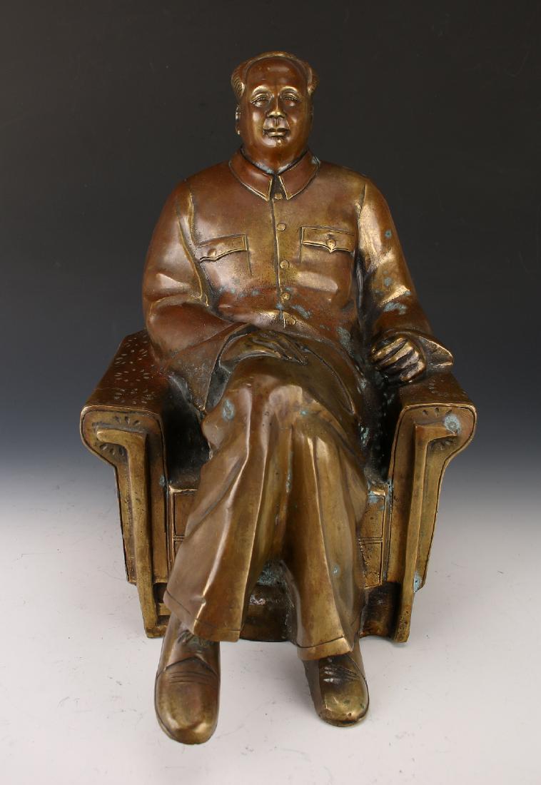 BRONZE OF CHAIRMAN MAO: Bronze Of Chairman Mao: A hollow cast bronze of Chairman Mao seated in an armchair in his traditional garb. 13 1/2" high, 10 1/2" long, 8" wide $100
