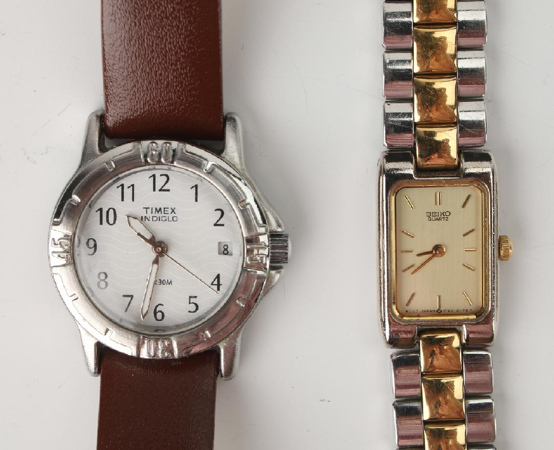 TIMEX AND SEIKO WATCHES: Timex And Seiko Watches: A woman's Timex Indiglo with leather band and a Seiko quartz with two tone link band. $100 - $200 Shipping: We are able to pack and s
