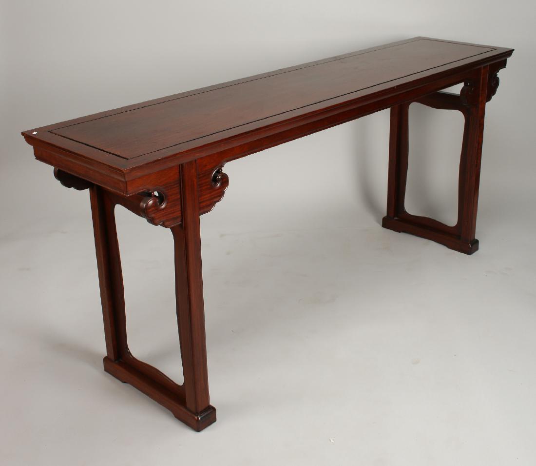 ROSEWOOD PAINTING TABLE: Rosewood Painting Table: A rosewood altar table with an inset top, a scalloped apron that resembles a puffy cloud, and squared legs.