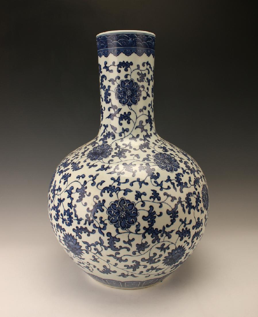 LARGE BLUE & WHITE VASE WITH FLORAL PATTERN (1 of 7)