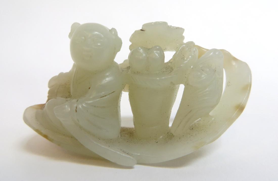 CHINESE JADE CARVING OF BOY IN LEAF BOAT (1 of 6)