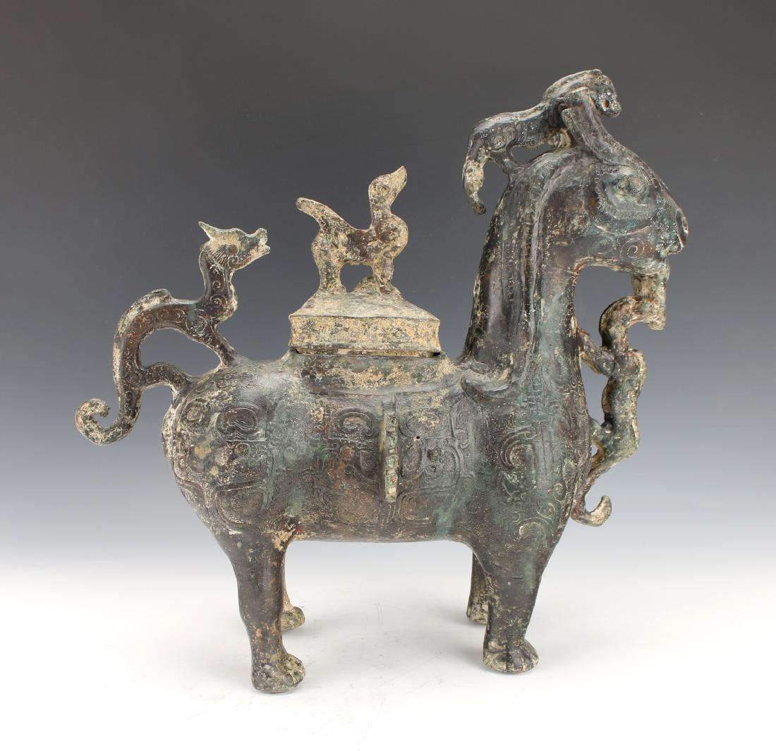 ARCHAIC FORM LIDDED CREATURE VESSEL (1 of 6)