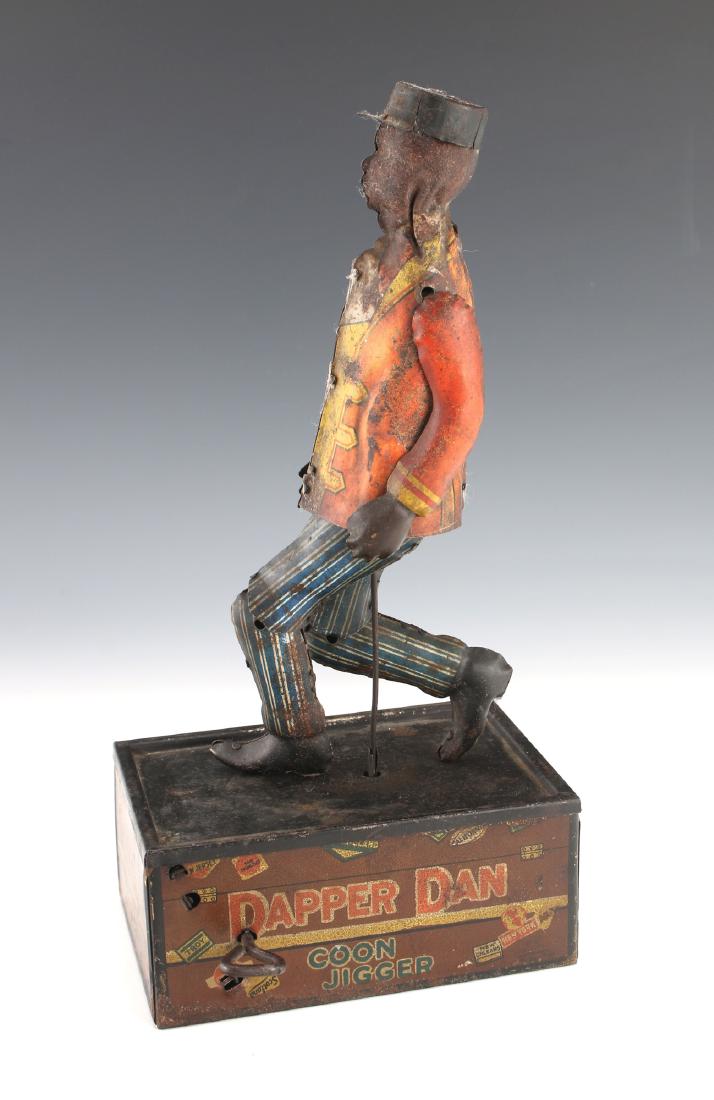 DAPPER DAN "COON JIGGER" WIND-UP TOY BY MARX: Dapper Dan "Coon Jigger" Wind-Up Toy By Marx: WInd-up mechanical dancing toy by Louis Marx & Co. 200 Fifth Ave, New York, NY USA. Dapper Dan Coon Jigger, The Jigging Porter. Licensed &am
