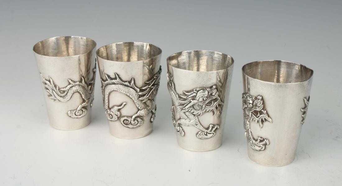 FOUR CHINESE EXPORT SILVER SHOT GLASSES (1 of 5)