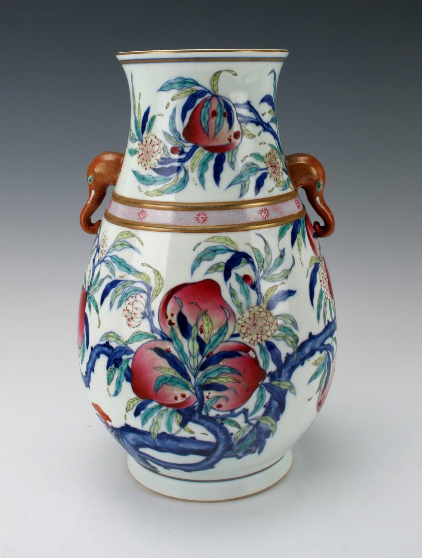 "HUNDRED DEER" SHAPE VASE WITH PEACHES (1 of 7)