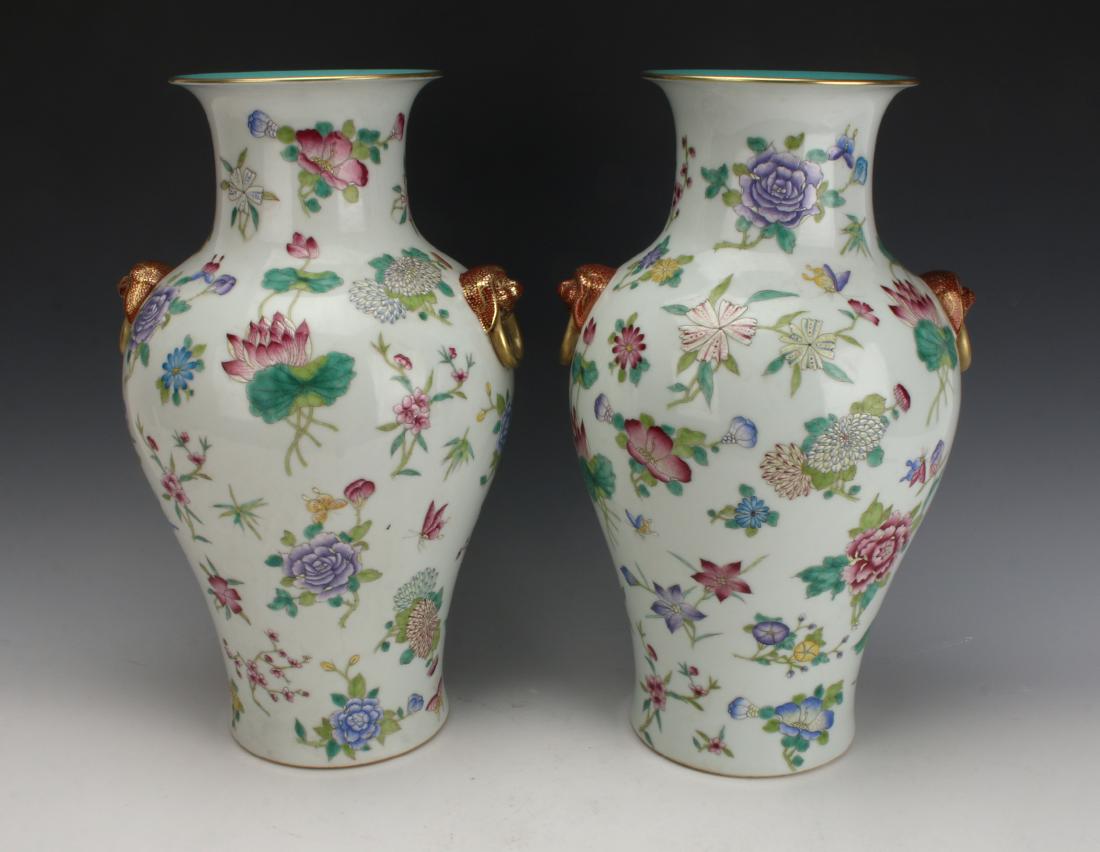 PAIR OF FLOWER VASES (1 of 10)