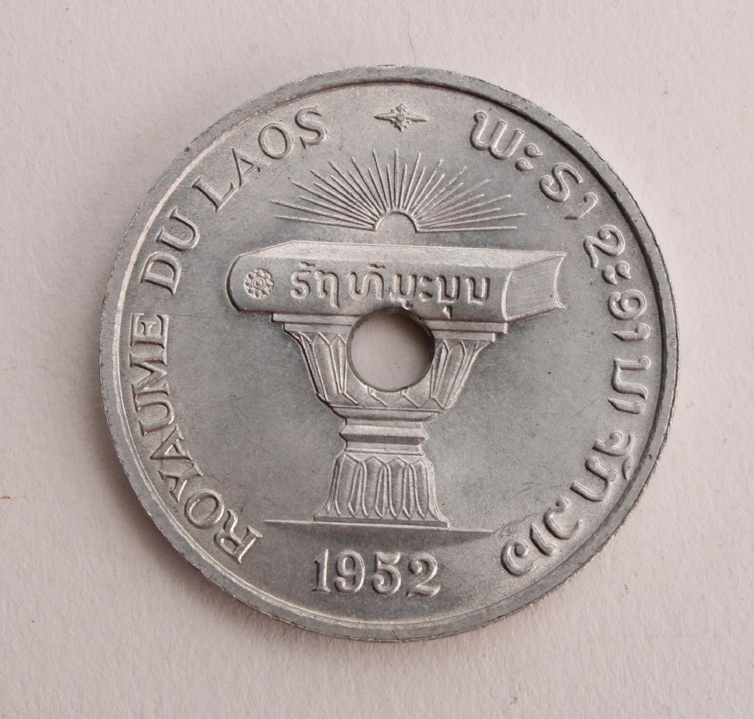 1952 LAO 50 CENT KM: 1952 LAO 50 CENT KM: 1952 LAO 50 Cent KM. $100 - $200 Shipping: We are able to pack and ship this item to an address in the United States for $15.00 via USPS