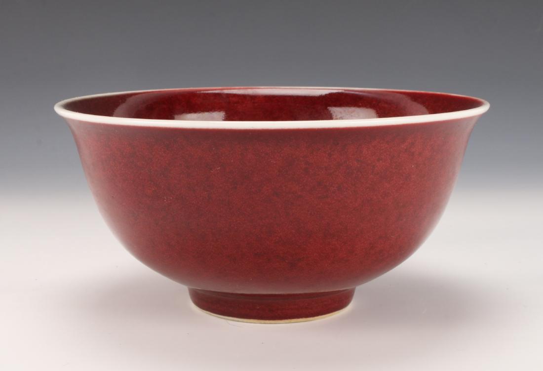 OX BLOOD BOWL: OX BLOOD BOWL: Ox blood glaze on inside and out with a pale celadon rim. Marked on the bottom. 6" X 3" $100 - $200 Shipping:
