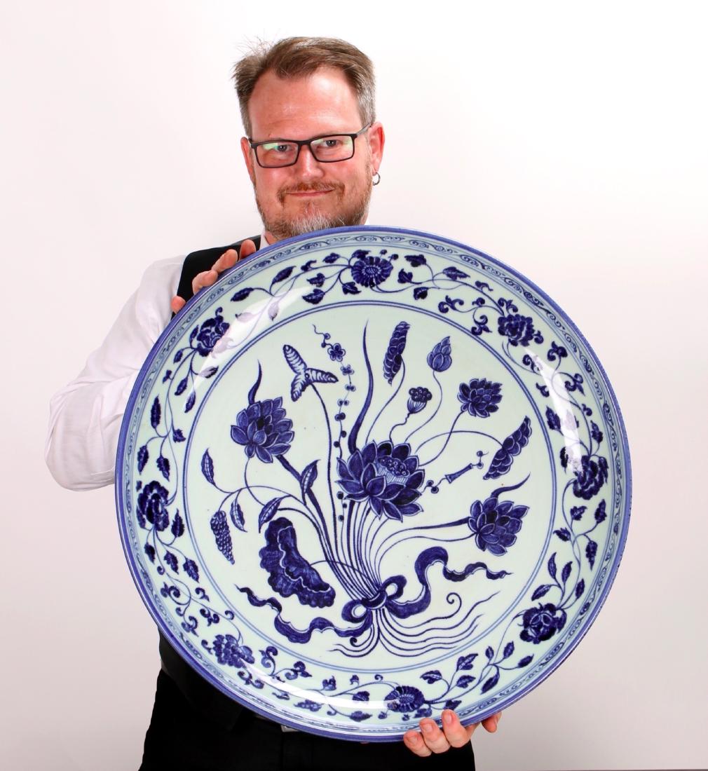LARGE BLUE & WHITE MING DYNASTY LOTUS CHARGER: LARGE BLUE & WHITE MING DYNASTY LOTUS CHARGER: The center has a bouquet of water flowers surrounded by a wide flower and tendril border. The outside rim repeats the flower and tendril border under